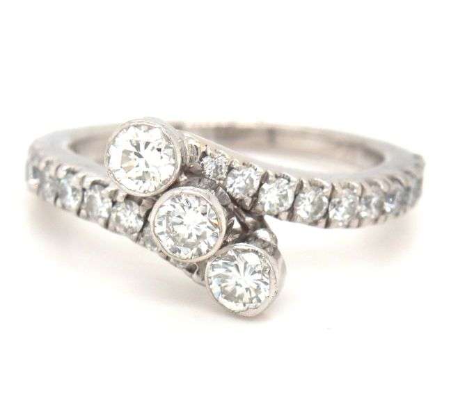 14kt White gold 1ctw 3 diamond bypass ring