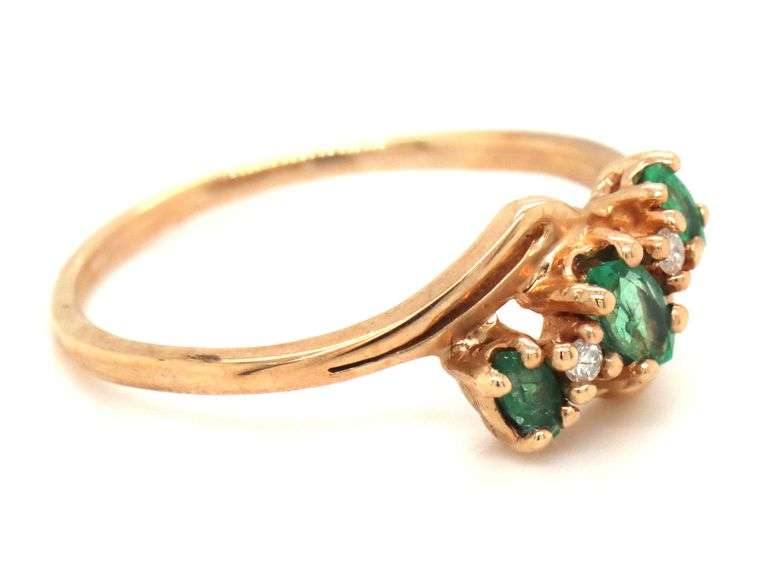 10kt Yellow gold emerald and diamond ring