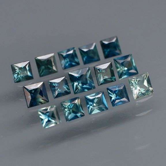 Stunning! 3.37ct set of blue green princess cut Sapphires