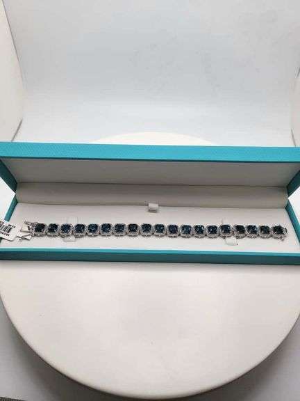 Magnificenrt  22 ctw London blue Topaz and diamond bracelet