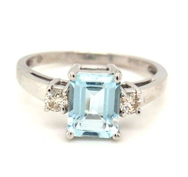 14kt White gold 1.45ct Emerald cut Aquamarine and 0.20ctw diamond ring