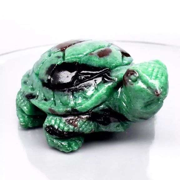 Very large 344.65ct natural Ruby in Zoisite carving