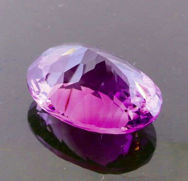 Amazing 21.73ct high fire concave cut pure Amethyst
