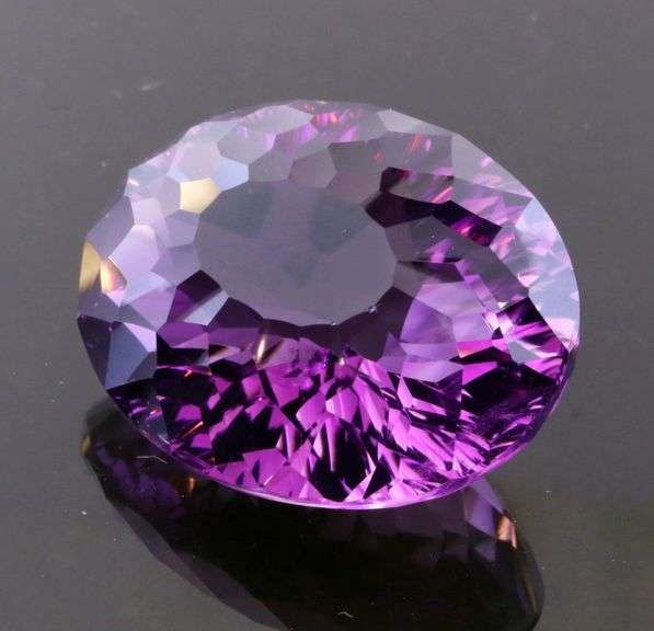 Top tier 26.87ct concave cut Amethyst