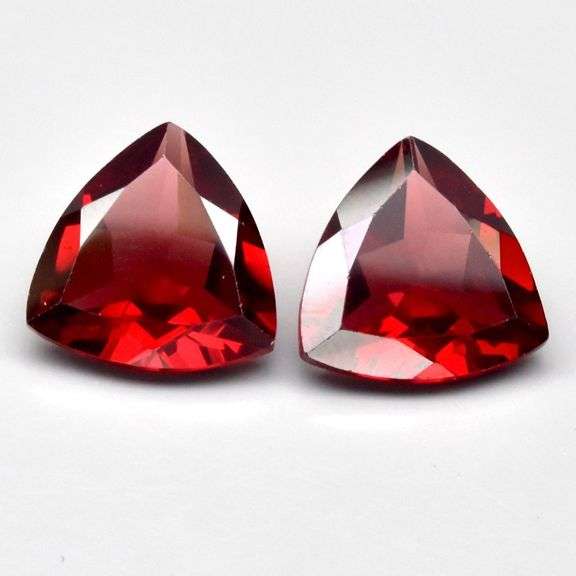 Mozambique red! 7.08ct matched trillion cut Garnet pair!