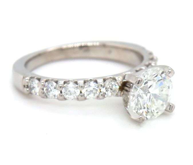 Platinum 1.19ct round brilliant cut and 0.50ctw diamond engagement ring
