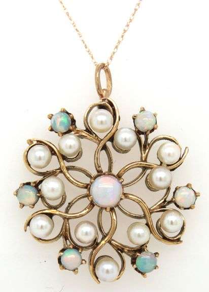 14kt Yellow gold opal and pearl knot pendant on chain