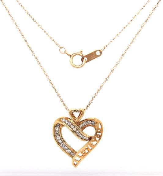 10kt Yellow gold heart shaped diamond pendant on chain