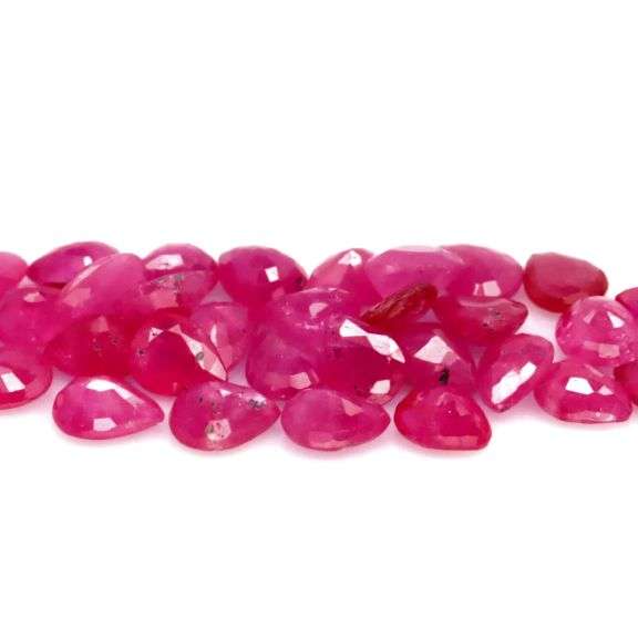 Lovely 10.40ct 31 piece pear cut Ruby set -Heated only!!!