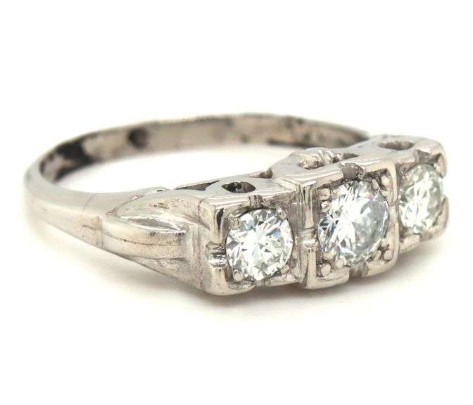 Vintage style 3 stone diamond ring in Platinum