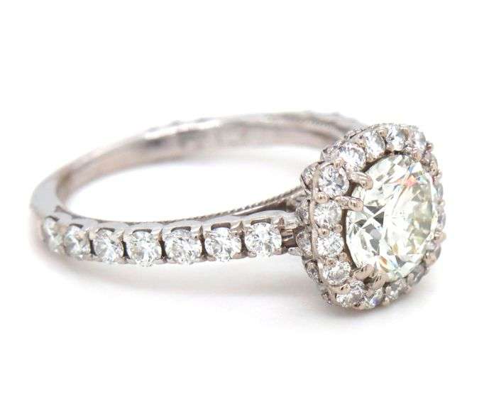 18kt White gold Tacori 1ct round brilliant cut and 0.65ctw diamond halo engagement ring