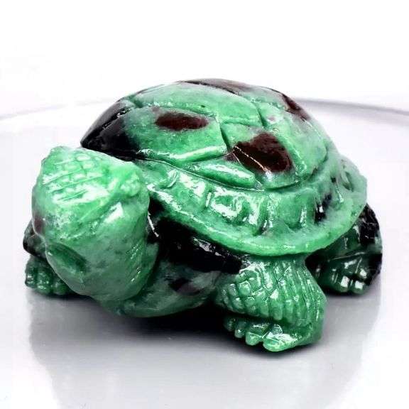 Very large 344.65ct natural Ruby in Zoisite carving