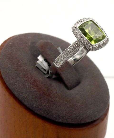 18kt White gold 3.14ct Peridot with 0.66ctw pave diamond halo and shank