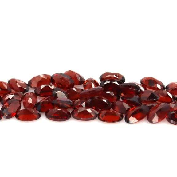 Amazing 12.15ct oval cut red Garnet set