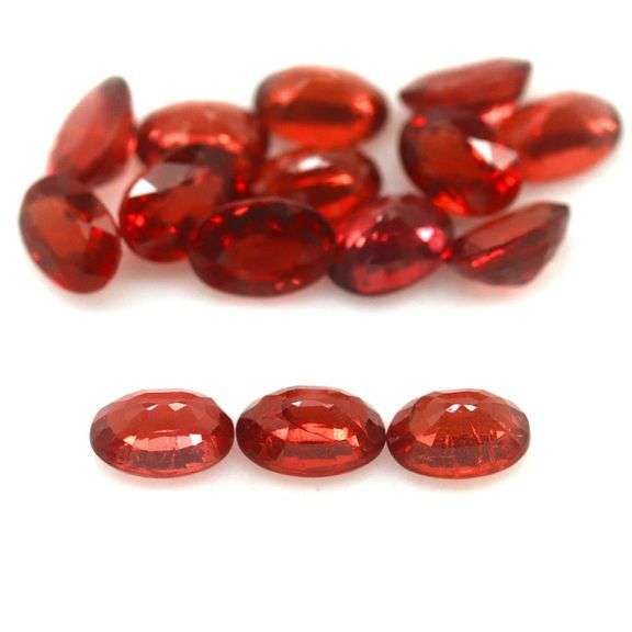 Amazing 9.85ct oval cut cherry red Garnet set