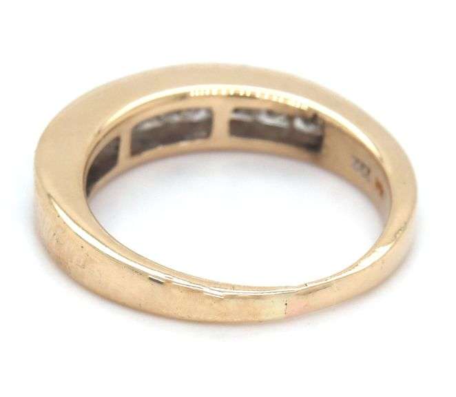 14kt Yellow gold 0.75ctw princess cut channel set graduated band