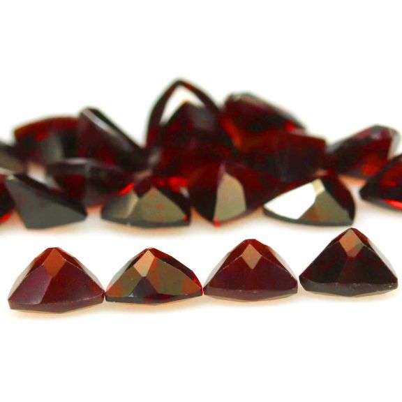 Stunning 10.86ct trillion cut cherry red Garnet set