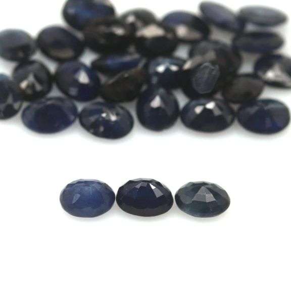 Heated only! 10.22ct blue black Sapphire set from Madagascar