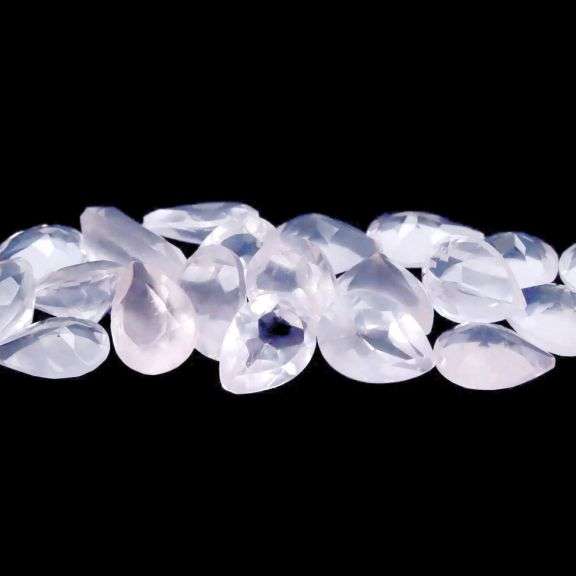 Glowing! 13.12ct powder pink Rose Quartz set