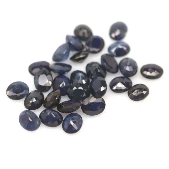 Heated only! 10.22ct blue black Sapphire set from Madagascar
