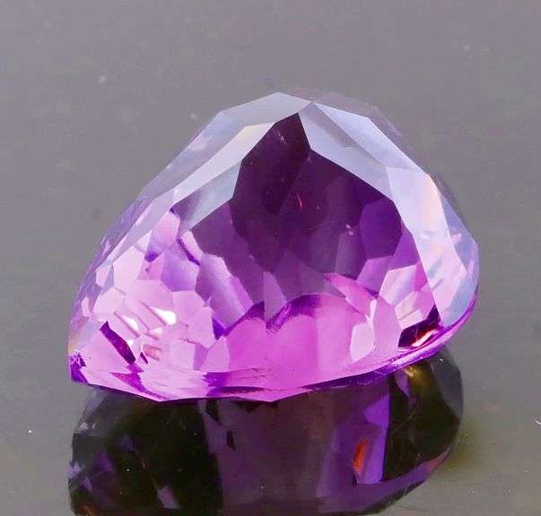 Lovely 12.81ct concave cut Amethyst