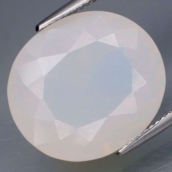 Glowing 16.05ct snow white Fire Opal!