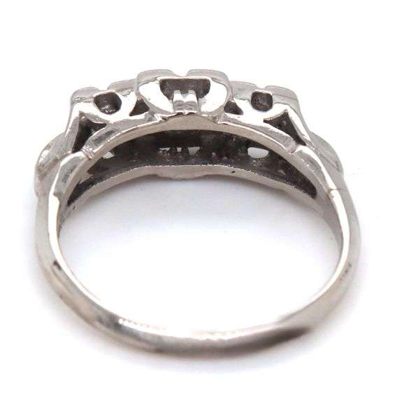 Vintage style 3 stone diamond ring in Platinum