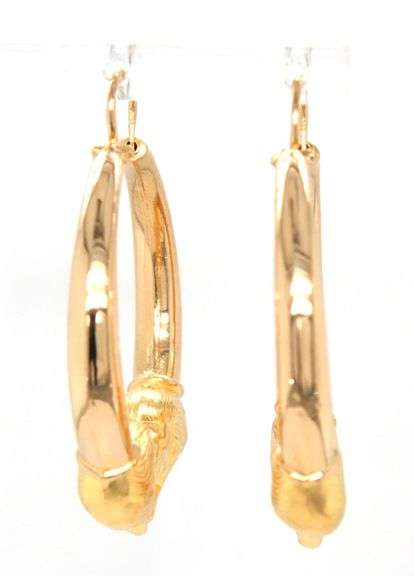 18ktt Yellow gold double lions head hoop earrings