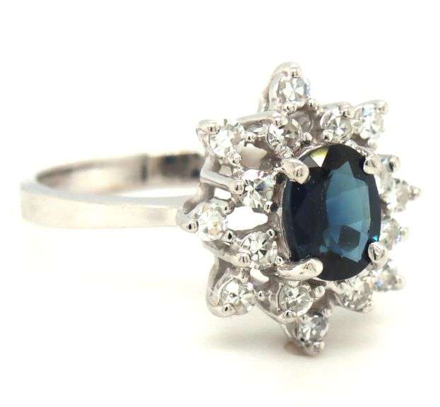 14kt White gold oval sapphire and single cut diamond cluster flower earrings