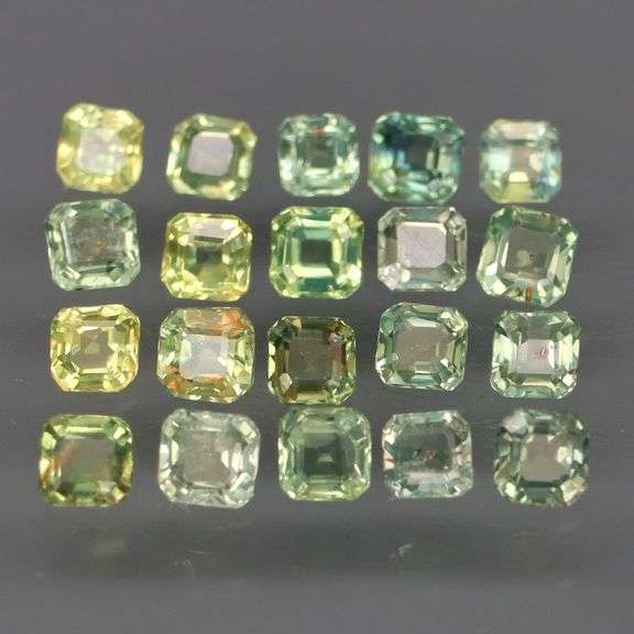 Untreated! Fantastic 2.50ct bright green Sapphire set!
