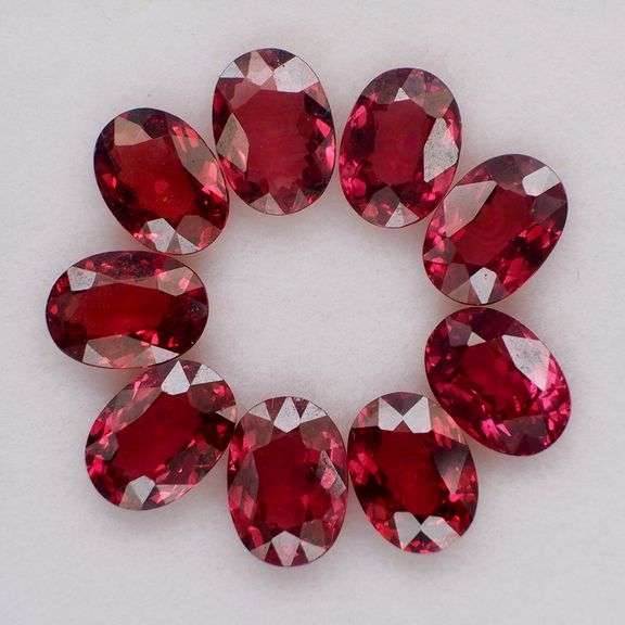 Amazing 8ct oval cut violet red Garnet set