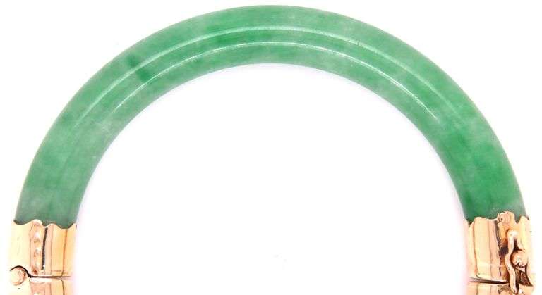 Green Jade hinged bangle bracelet in yellow gold