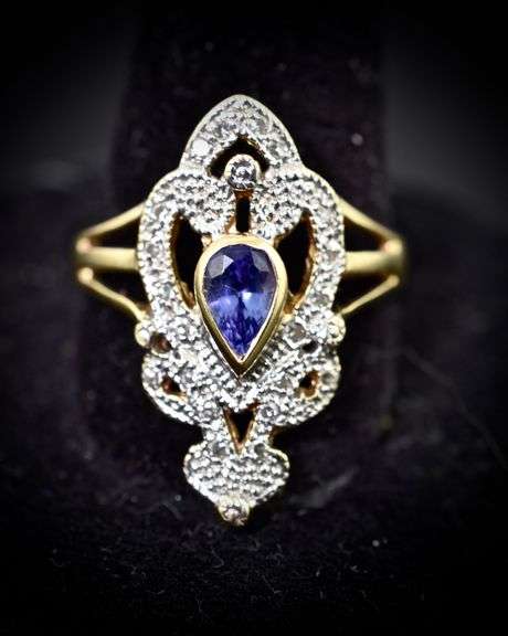 Feminine 14K Yellow Gold Ring with Pear Shaped Tanzanite