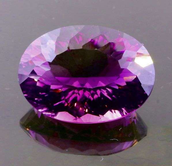 Amazing 21.73ct high fire concave cut pure Amethyst