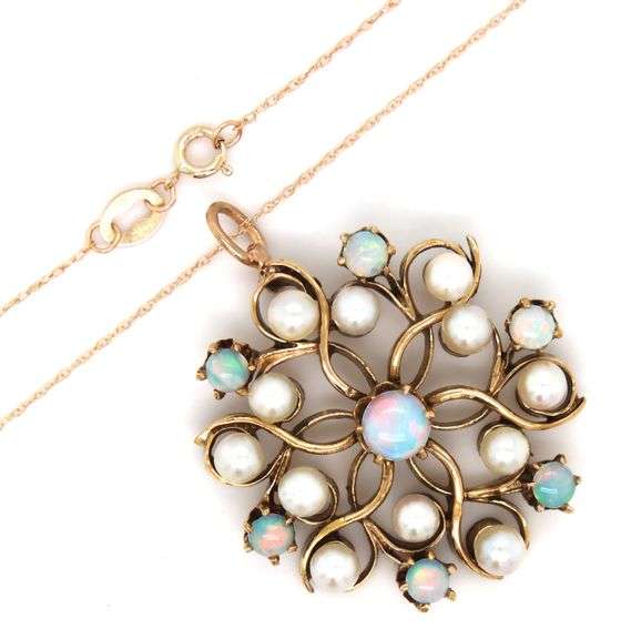 14kt Yellow gold opal and pearl knot pendant on chain
