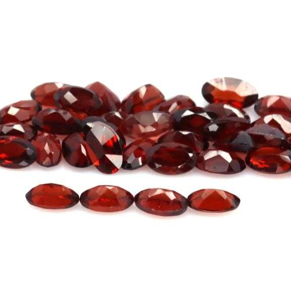 Amazing 12.15ct oval cut red Garnet set