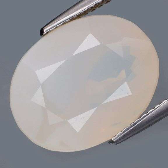 Glowing 7.08ct phantom white Fire Opal!