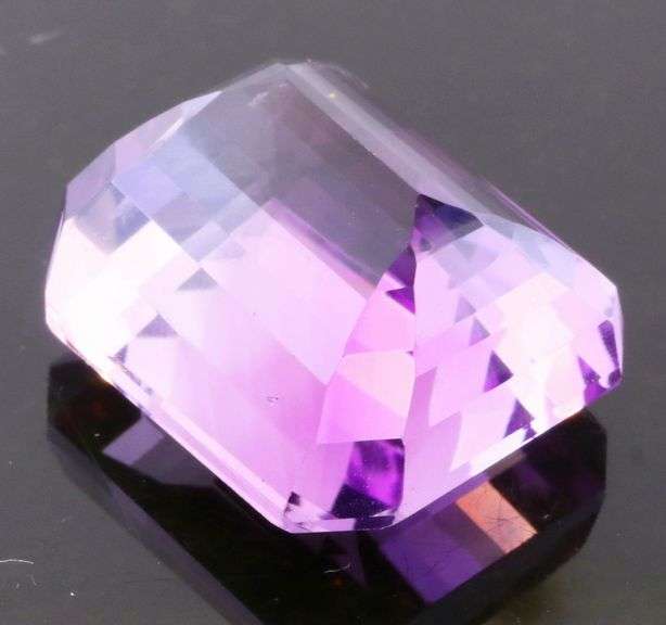 Bright violet 20.05ct emerald cut Amethyst