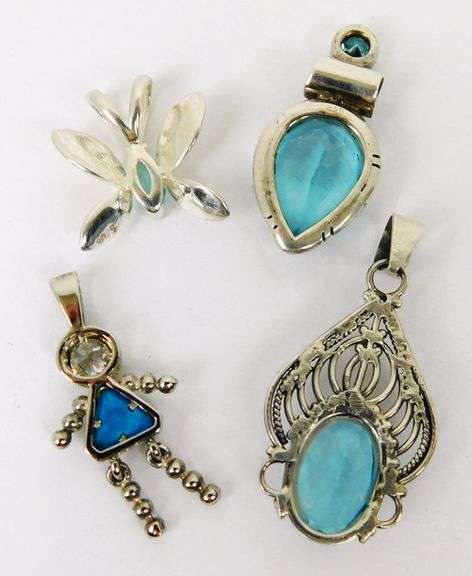 4 Sterling Silver Pendants with Blue Stones