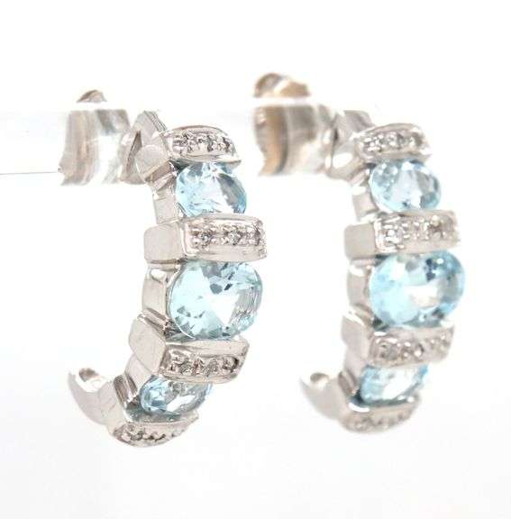 14kt White gold 2.50ctw aquamarine and diamond accent earrings