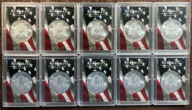 Ten (10) Superb Gem BU 2003 $1 American Silver Eagles in custom holders