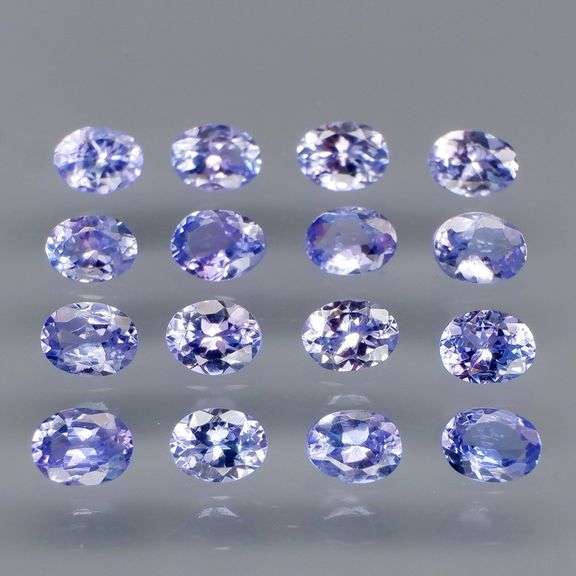 Heavy flashing 2.84ct oval cut Tanzanite set