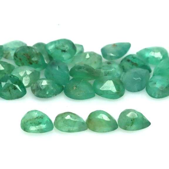 Bright emerald green 7.13ct 33pc Emerald set