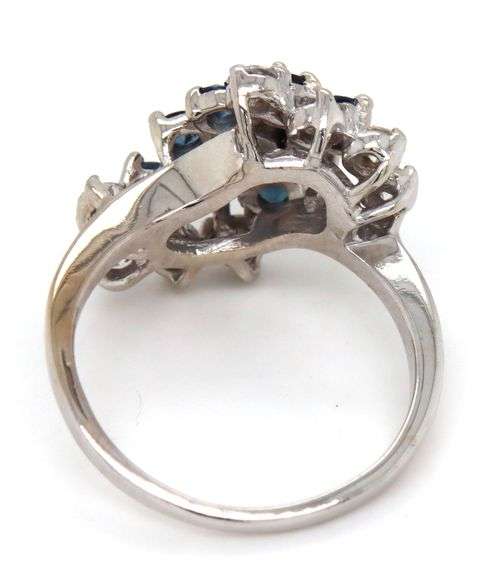 14kt White gold 1.15ctw diamond and blue sapphire cluster ring