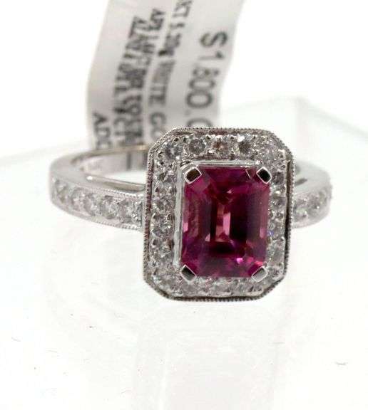 14kt White gold 1.65ct emerald cut tourmaline and diamond halo ring