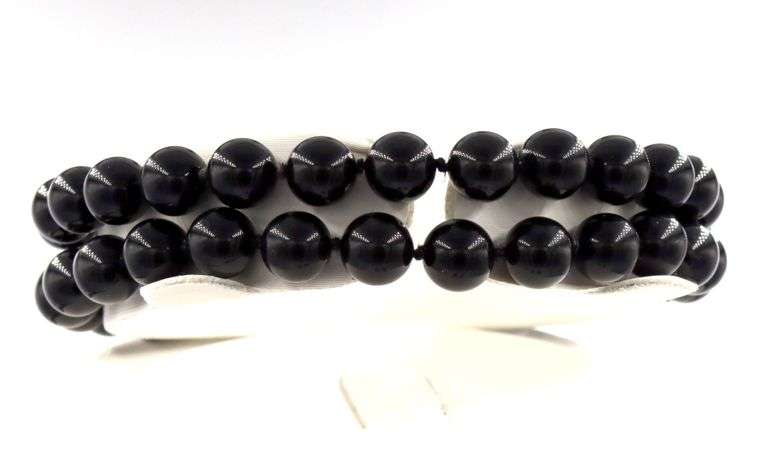 Set of black onyx beaded necklace, bracelet and stud