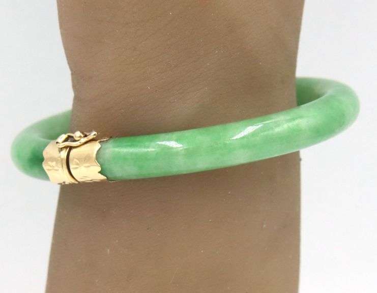 Green Jade hinged bangle bracelet in yellow gold