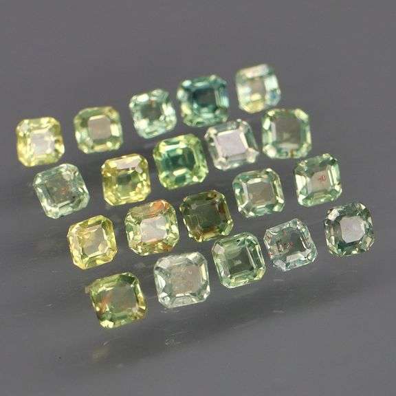 Untreated! Fantastic 2.50ct bright green Sapphire set!