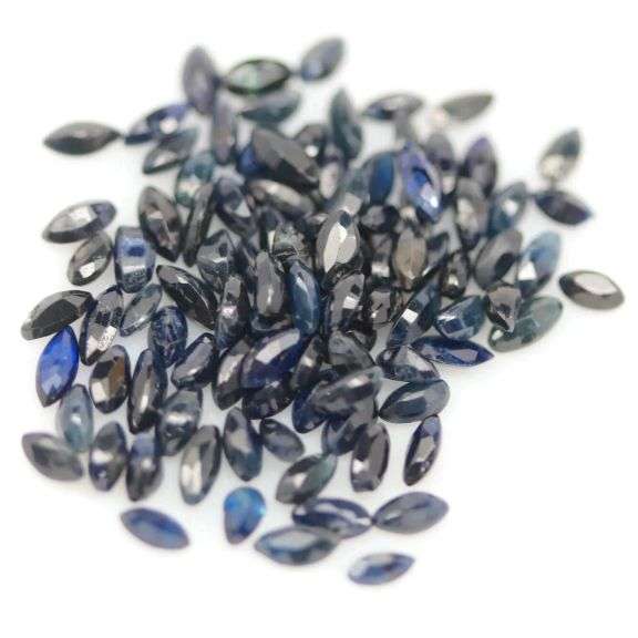 Stunning deep blue 12.58ct marquise cut Sapphire set