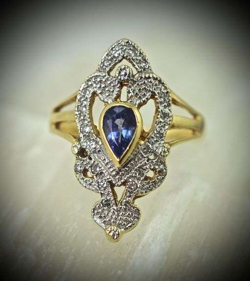 Feminine 14K Yellow Gold Ring with Pear Shaped Tanzanite